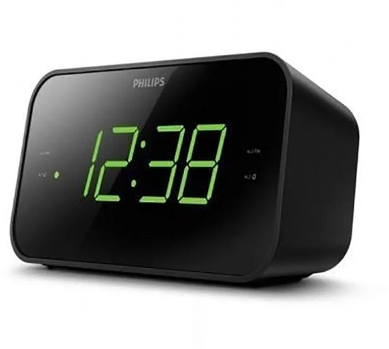 Zwarte Philips wekkerradio met groene digitale cijfers, van de zijkant gezien.