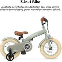 Vélo d'enfant vert Deryan 3-en-1 avec détails marron, isolé sur fond blanc.