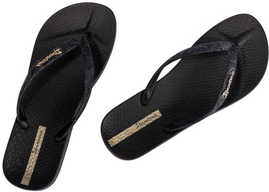 Zwarte Ipanema slippers met glitterbandjes en gouden logo.