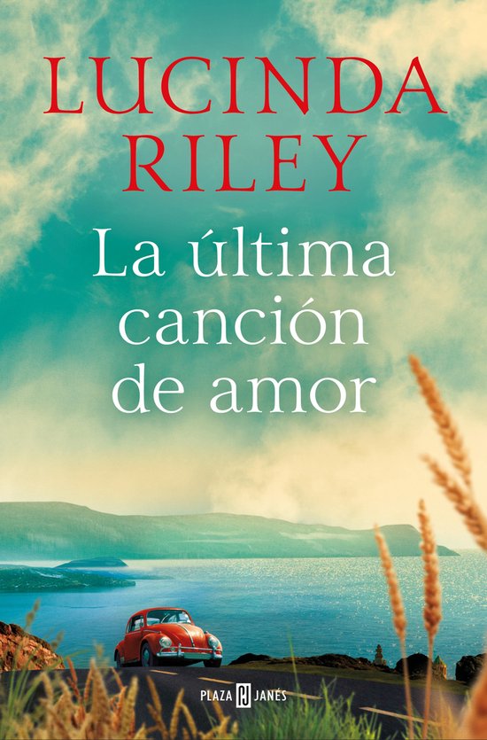Boekcover met de titel 'La última canción de amor' van Lucinda Riley, met een rode auto op een weg bij een meer.