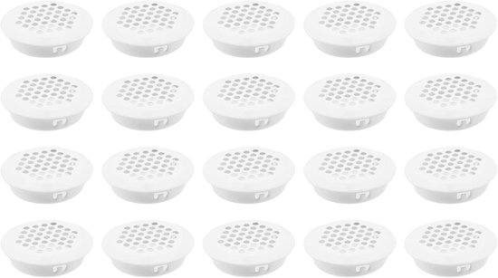 Een reeks witte ronde ventilatieroosters met een rasterpatroon.