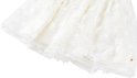 Off-white tule rok met bloemenapplicaties en gouden spikkels.