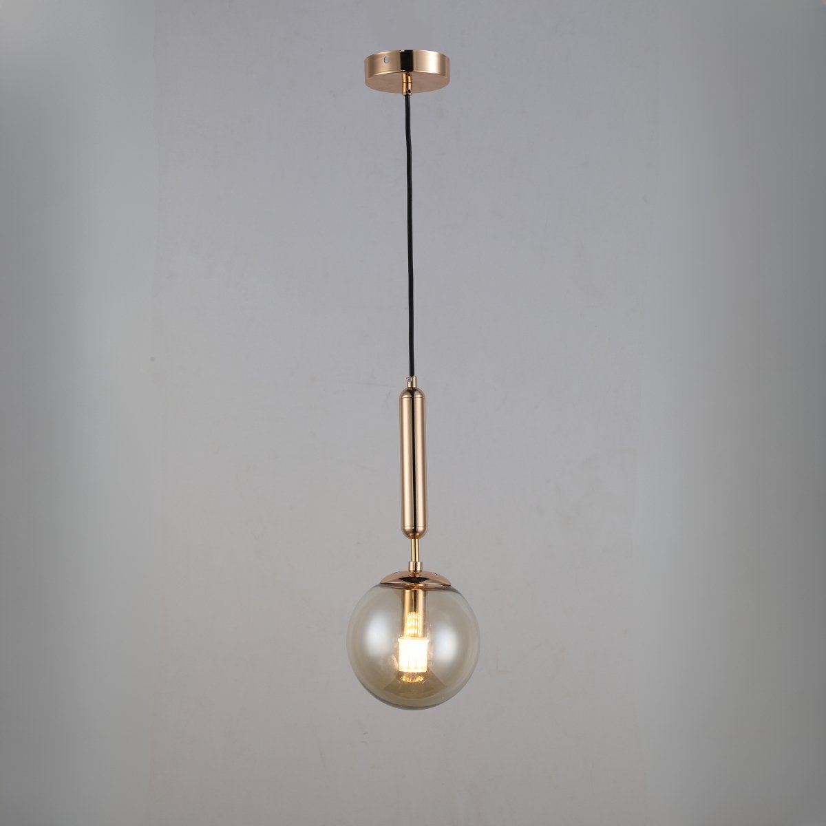 Hanglamp met 1 lichtpunt, amber kleur glas en ronde plaat