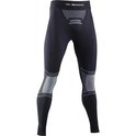 Sous-vêtement de sport de compression noir X-Bionic avec texture côtelée, accents argentés aux genoux et rayures argentées.