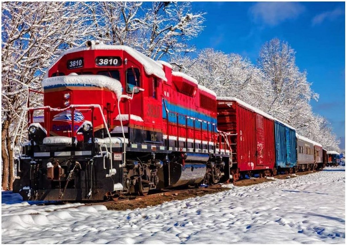 Puzzel 1500 stukjes: Rode Trein in Besneeuwd Landschap