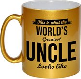 This is what the worlds greatest uncle looks like cadeau koffiemok / theebeker - goudkleurig - 330 ml - verjaardag / bedankje - tekst mokken