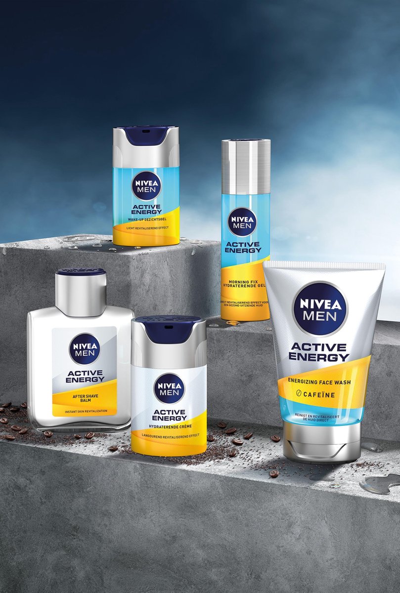 NIVEA MEN "ACTIVE ENERGY" anti-vermoeidheid crème met cafeïne en guarana, 50ml, op witte en oranje verpakking.