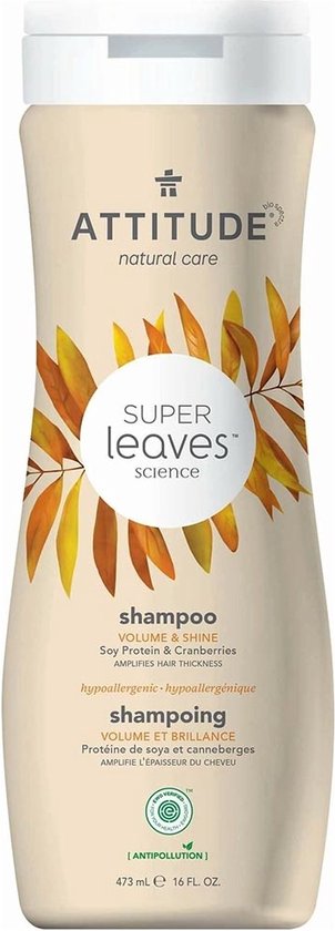 Crèmekleurige fles met bladerenprint. "Super Leaves science", "volume & shine shampoo".