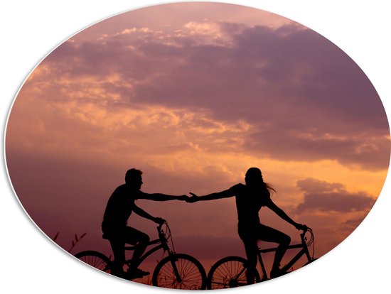 WallClassics - Feuille de mousse PVC ovale - Silhouette de couple à vélo près du soleil du soir - Photo 80x60 cm sur ovale (avec système de suspension)