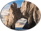 Dibond Ovaal - Grote Rotsen Boog genaamd ''The Arch of Cabo San Lucas'', Mexico - 40x30 cm Foto op Ovaal (Met Ophangsysteem)