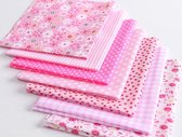 Pakket van 7 lapjes stof - verschillende designs - roze - 24 x 25 cm - quilt - patchwork - poppen kleertjes