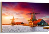Hout - Nederlandse Windmolens aan het Water onder Paars met Oranje Lucht - 105x70 cm - 9 mm dik - Foto op Hout (Met Ophangsysteem)