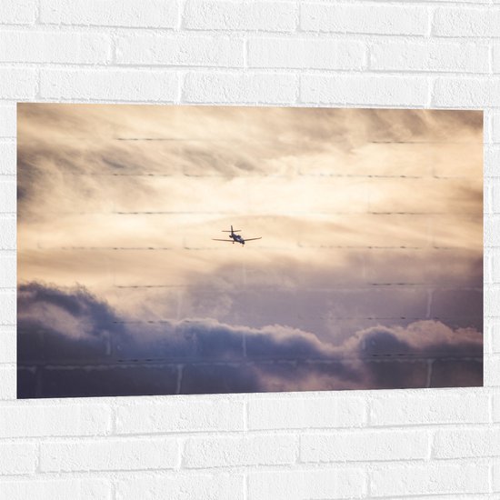 Muursticker - Vliegtuig tussen de Wolken - 90x60 cm Foto op Muursticker