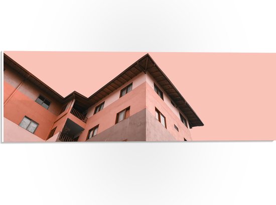 WallClassics - PVC Schuimplaat- Gekleurd Appartement met Roze lucht - 60x20 cm Foto op PVC Schuimplaat