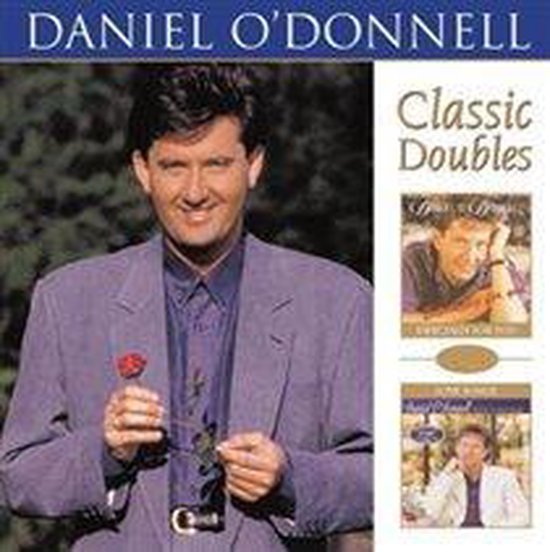 Daniel O'Donnell met een roos in zijn hand, draagt een paarse blazer. Albumhoes 'Classic Doubles'.