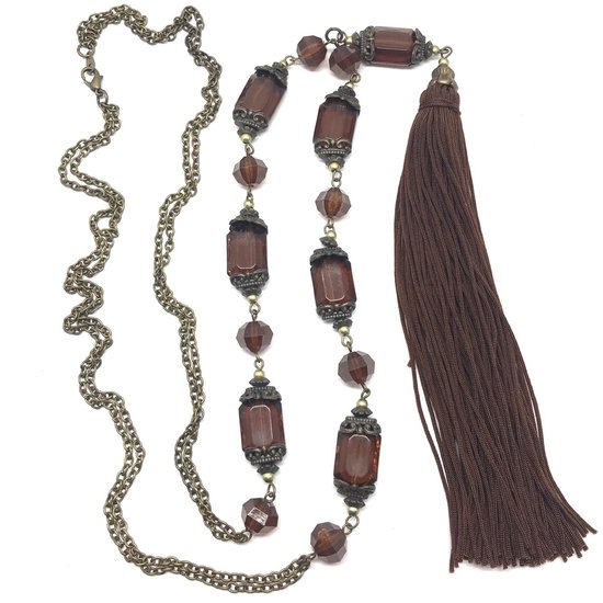Zilverkleurige lange halsketting met veren hanger | voor