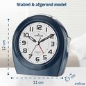 Stabiele, afgeronde donkerblauwe wekker. Diameter 11 cm, hoogte 12 cm, diepte 5,7 cm.
