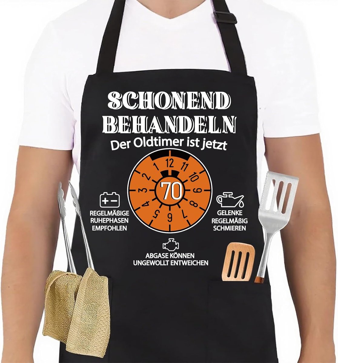 70e verjaardag man, keukenschort als cadeau voor 70e verjaardag, kookschort voor mannen vrouwen, zwart schort waterdicht met spreuk: voorzichtig behandelen van de oldtimer is nu 70
