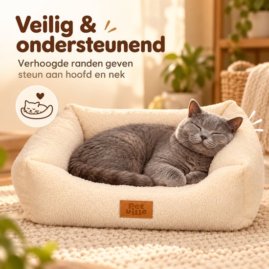 Grijze kat slaapt in Petville-mand met verhoogde randen. Tekst: Veilig & ondersteunend voor hoofd en nek.
