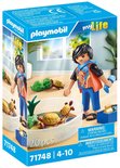 Verpakking van Playmobil My Life set 71748 met een figuur die schildpadden in een terrarium verzorgt.