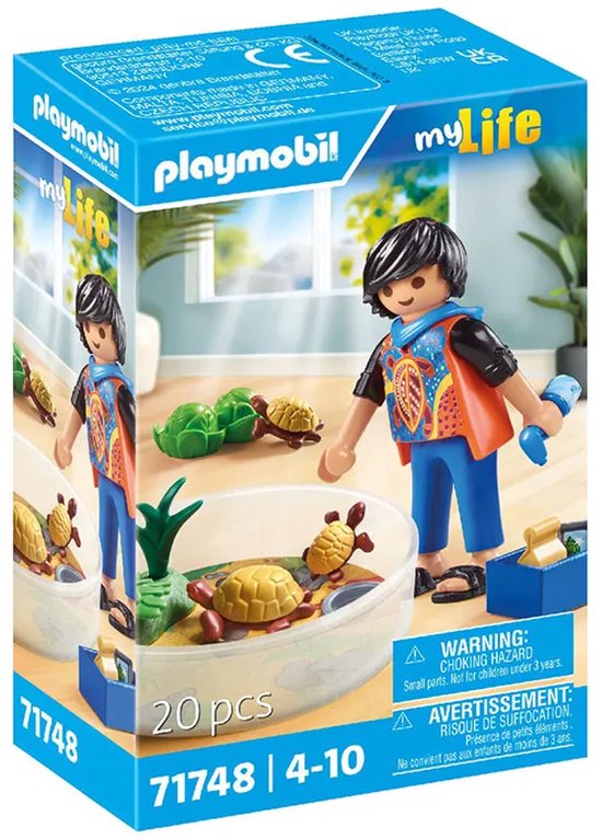 Verpakking van Playmobil My Life set 71748 met een figuur die schildpadden in een terrarium verzorgt.