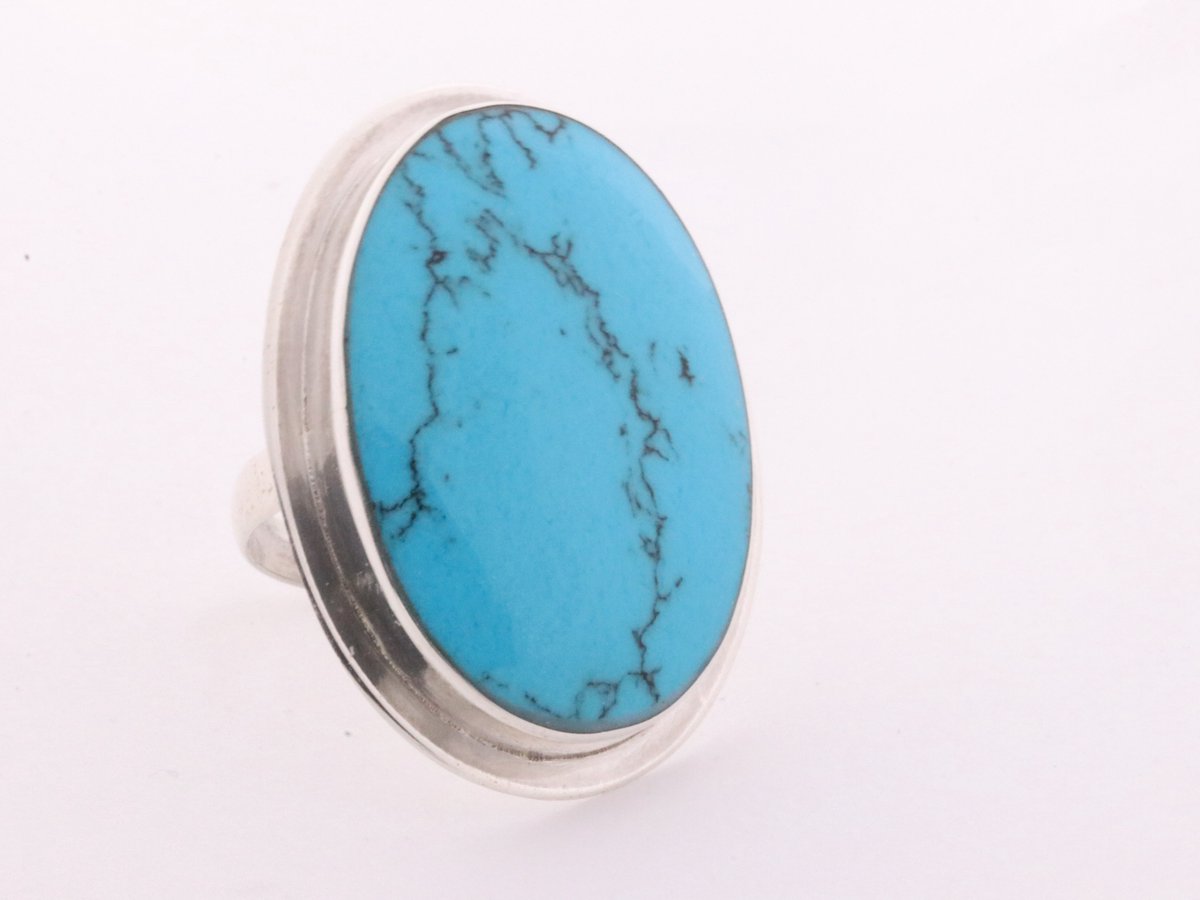 Grote ovale zilveren ring met blauwe turkoois - maat 18