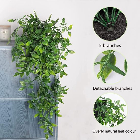 Groene kunstplant met 5 afneembare takken en een natuurlijke bladkleur, geplaatst op een grijze kast.