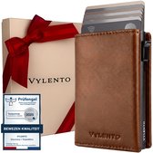 Bruine Vylento pasjeshouder naast een geschenkdoos en een Prüfengel-certificaat voor bewezen kwaliteit.