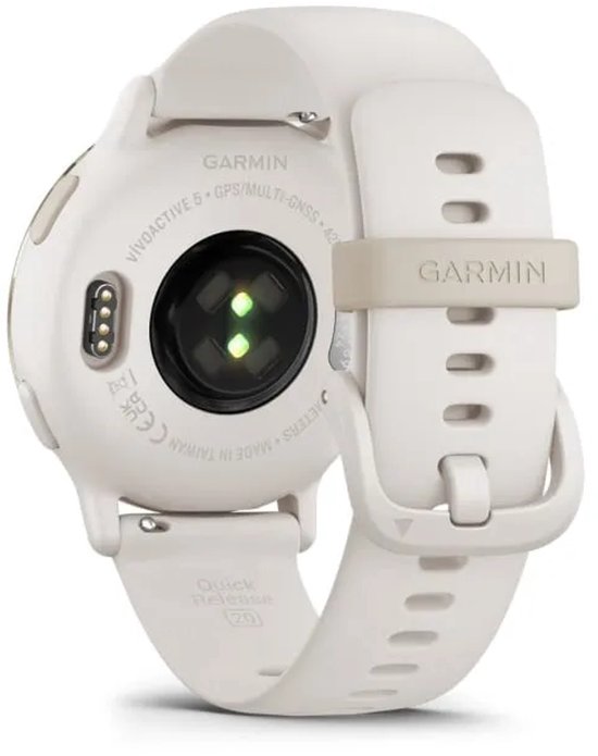 Achterkant van de Garmin Vivoactive 5 in ivoor, met hartslagsensoren en oplaadpunten.