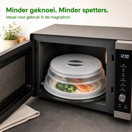 Grijs, inklapbaar magnetrondeksel met stoomopeningen, dat een bord met zalm en broccoli afdekt.