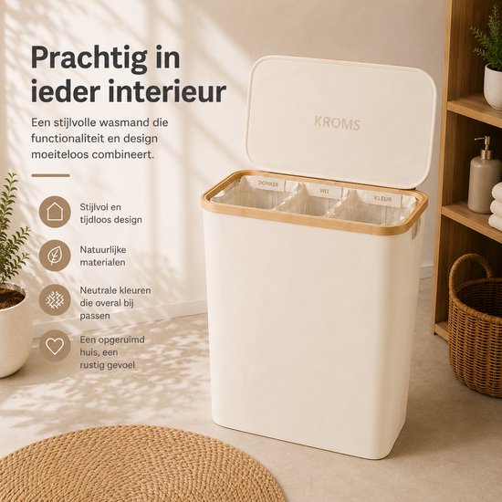 Beige wasmand met bamboe accenten, deksel geopend. Drie sorteervakken voor donker, wit en kleur. Staat in een stijlvol interieur.