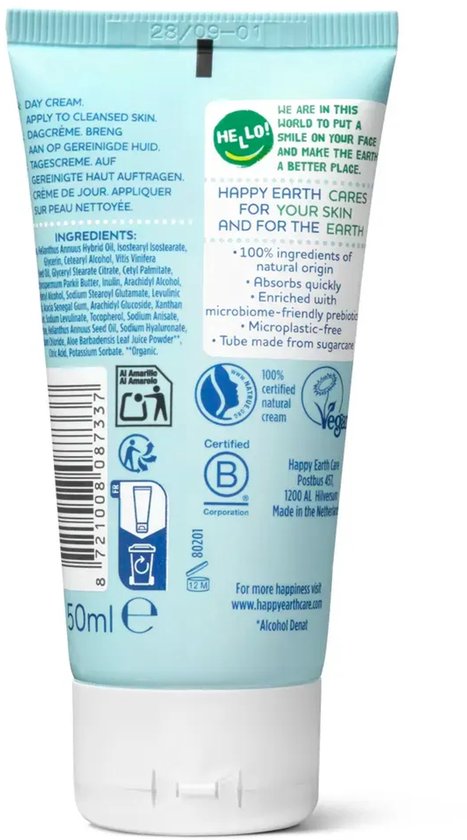 Achterkant van een lichtblauwe tube met de ingrediëntenlijst, gebruiksaanwijzing en informatie over "Happy Earth".