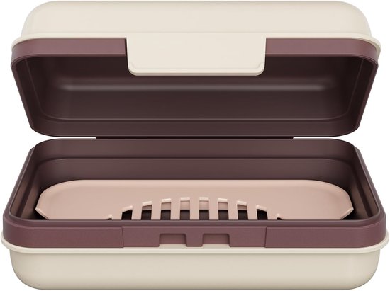 Boîte à savon ouverte en crème et marron, avec un insert perforé rose pâle.