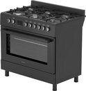Zwart gasfornuis met 6 branders, oven met glazen deur en bedieningsknoppen aan de voorkant.