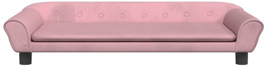Lit pour chien rose en velours avec boutons, pieds sombres, bords relevés