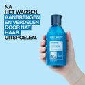 Blauwe fles Redken Extreme conditioner, 300 ml, met tekst "NA HET WASSEN, AANBRENGEN EN VERDELEN DOOR NAT HAAR. UITSPOELEN."