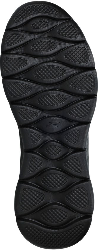 Zwarte Skechers Go Walk Flex instapper, de zool heeft een golvend patroon met grip.