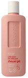 Roze fles Seepje witte perzik en cederhout douchegel met witte dop. Tekst: 99.1% natural origin, white peach and cedarwood shower gel.