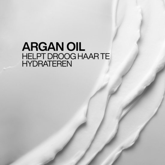 Texture crémeuse avec le texte 'ARGAN OIL AIDE A HYDRATER LES CHEVEUX SECS'.