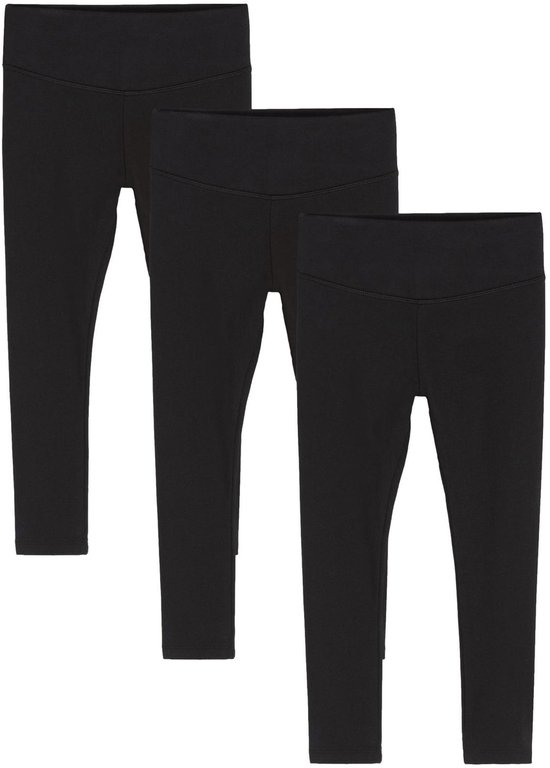 Drie zwarte leggings met een brede tailleband, van voren gezien.