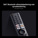 Zwarte afstandsbediening met numerieke toetsen, navigatieknoppen en sneltoetsen voor streamingdiensten.