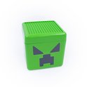 Dicht deksel van een groene creeper-opbergdoos met nopjes voor blokjes.