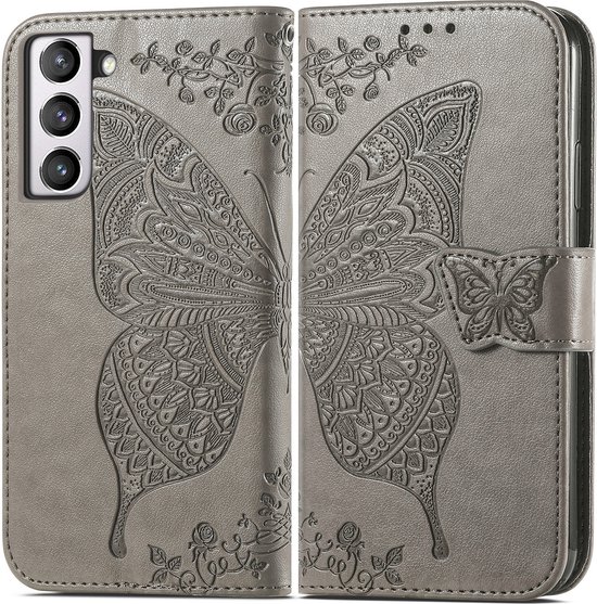 Étui portefeuille gris avec un grand papillon détaillé et des motifs floraux en relief.