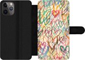 Bookcase Geschikt voor iPhone 11 Pro Max telefoonhoesje - Een illustratie met hartjes op de achtergrond - Met vakjes - Wallet case met magneetsluiting