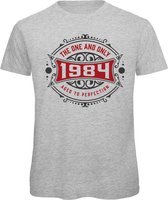 1984 The One And Only | Feest Kado T-Shirt Heren - Dames | Antraciet - Donker Rood | Perfect Verjaardag Cadeau Shirt | Grappige Spreuken - Zinnen - Teksten | Maat L