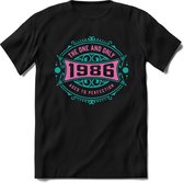 1986 The One And Only | Feest Kado T-Shirt Heren - Dames | Cobalt - Licht Roze | Perfect Verjaardag Cadeau Shirt | Grappige Spreuken - Zinnen - Teksten | Maat XL