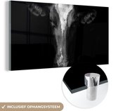MuchoWow® Glasschilderij 160x80 cm - Schilderij acrylglas - Koe - Dieren - Zwart - Foto op glas - Schilderijen