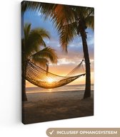 Canvas Schilderij Hangmat op het Caribische strand - 60x90 cm - Wanddecoratie