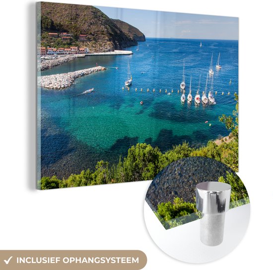 MuchoWow® Glasschilderij 90x60 cm - Schilderij acrylglas - Een uitzicht op zee vanaf het Capraia eiland bij Elba - Foto op glas - Schilderijen