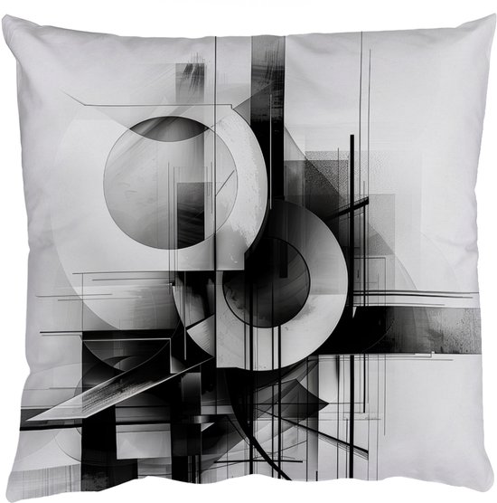 Coussin avec un design géométrique abstrait en noir et blanc, isolé sur fond blanc.